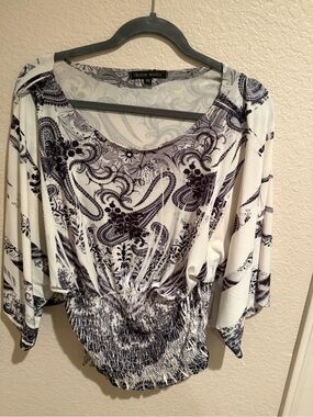 Beautiful black-and-white pattern pullover blouse by Design Works